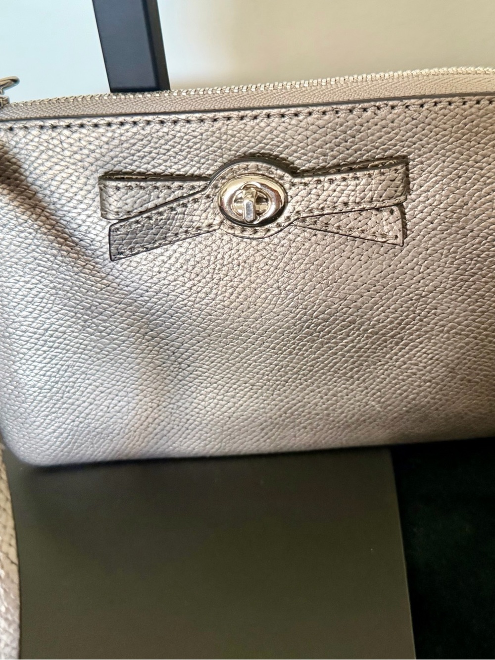 Coach Metallic Silver Bow Wristlet